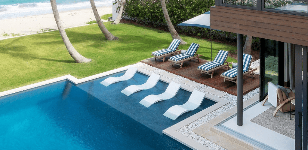 Swimming pool tanning ledge. GodoPools