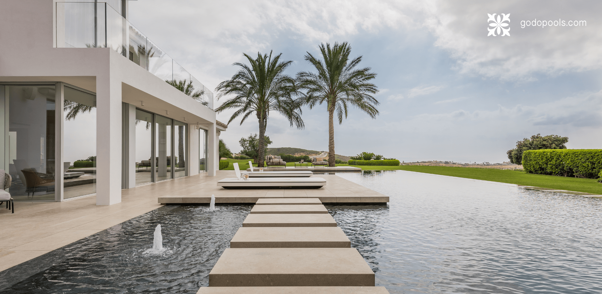 Cortesín Project by GodoPools with ecological pool treated with Pure Pool Technology