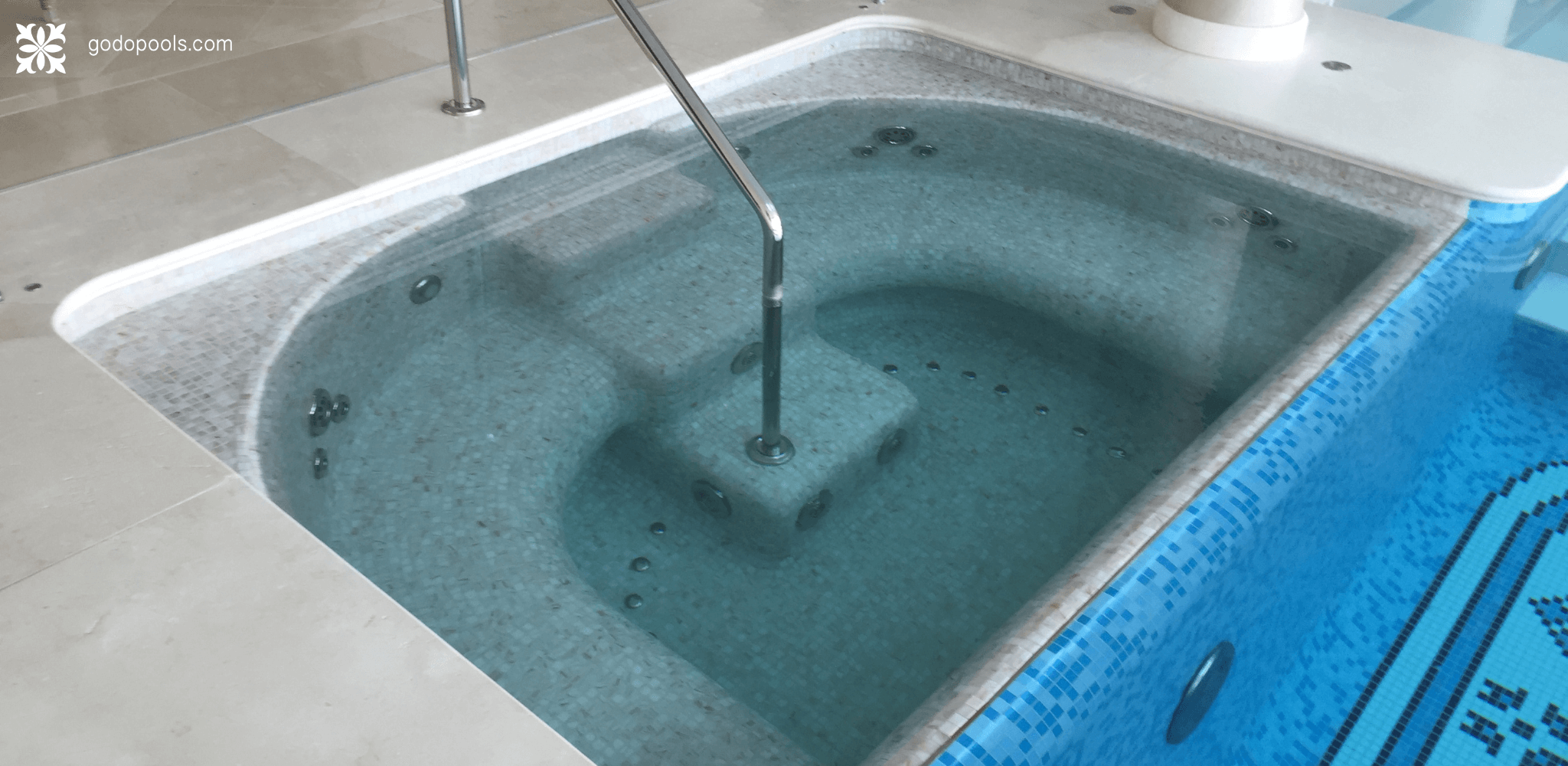 GodoPools project for an EPS hydromassage pool attached to an indoor pool